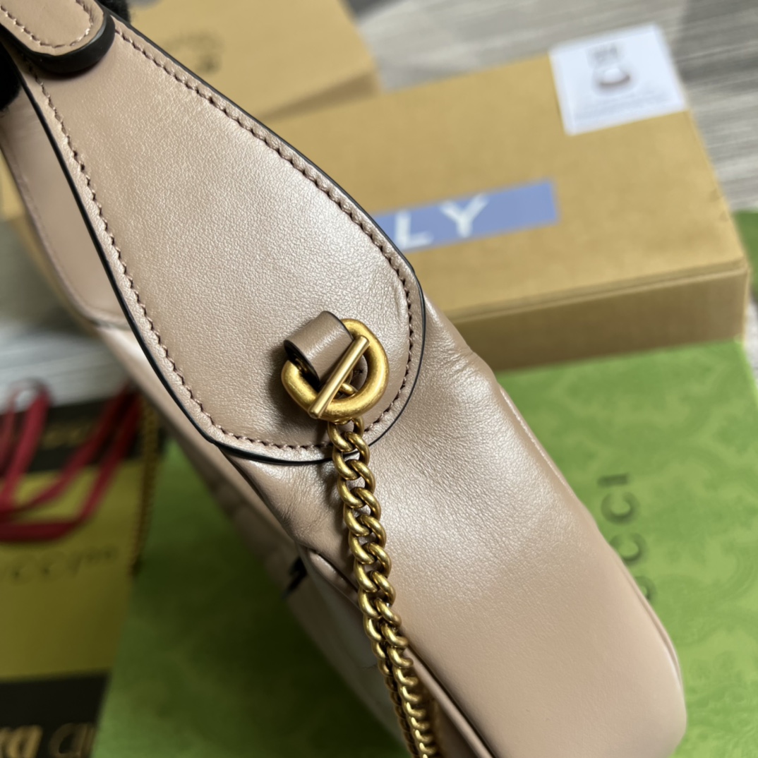 This mini handbag features a crescent-shaped silhouette and high-quality black leather, exuding a rich retro style. - Image 2