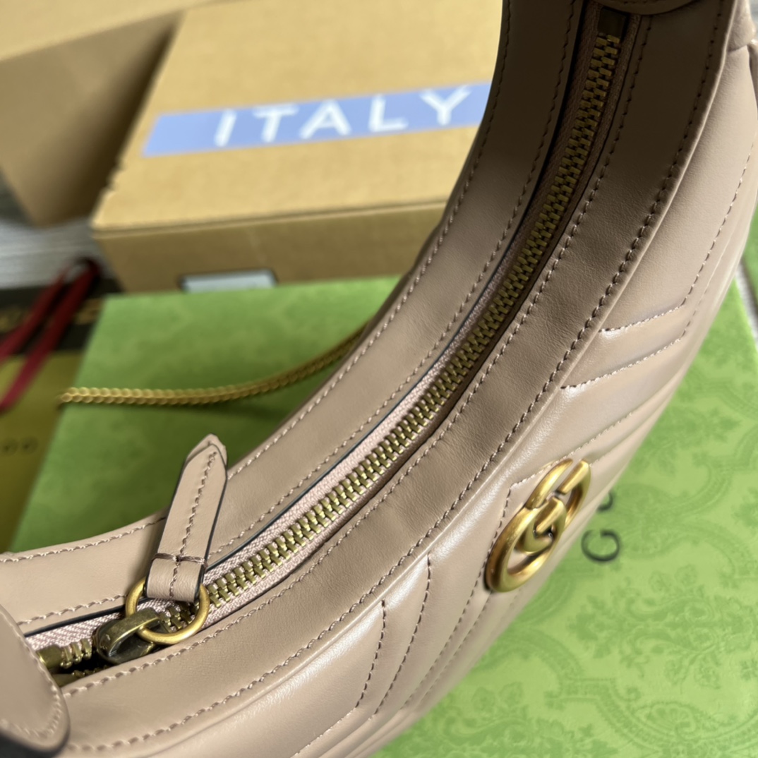 This mini handbag features a crescent-shaped silhouette and high-quality black leather, exuding a rich retro style. - Image 8