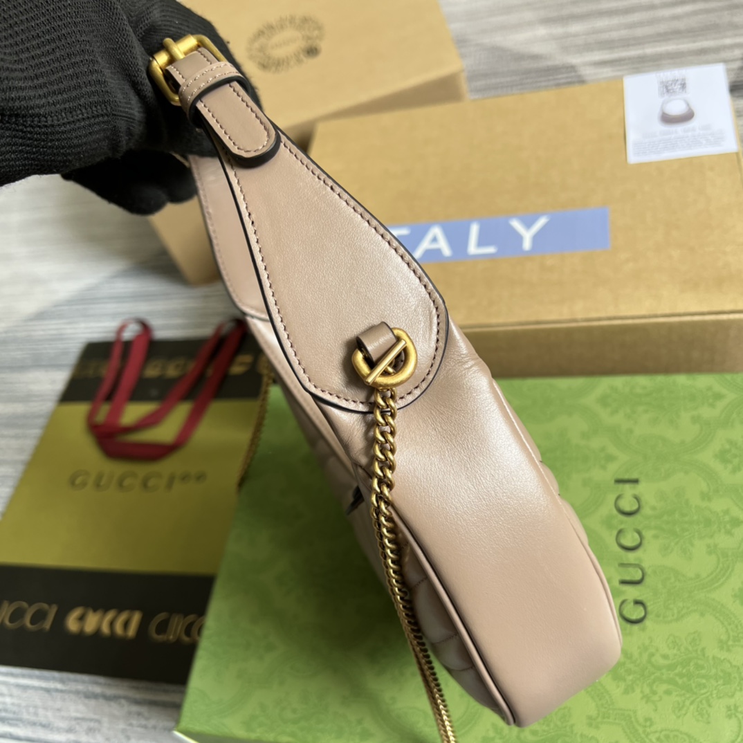 This mini handbag features a crescent-shaped silhouette and high-quality black leather, exuding a rich retro style. - Image 9