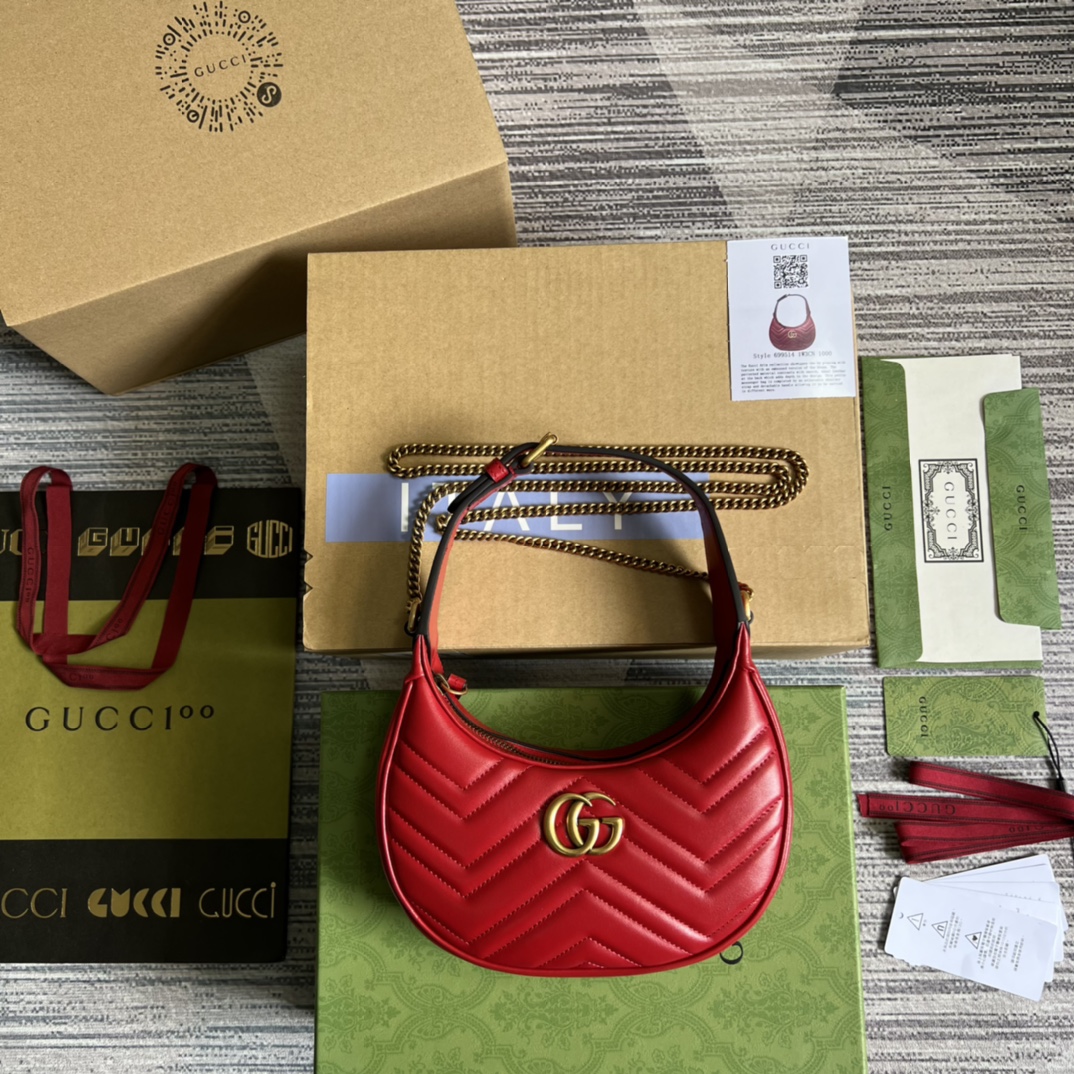 This mini handbag features a crescent-shaped silhouette and luxurious black leather, exuding a rich vintage style. - Image 7