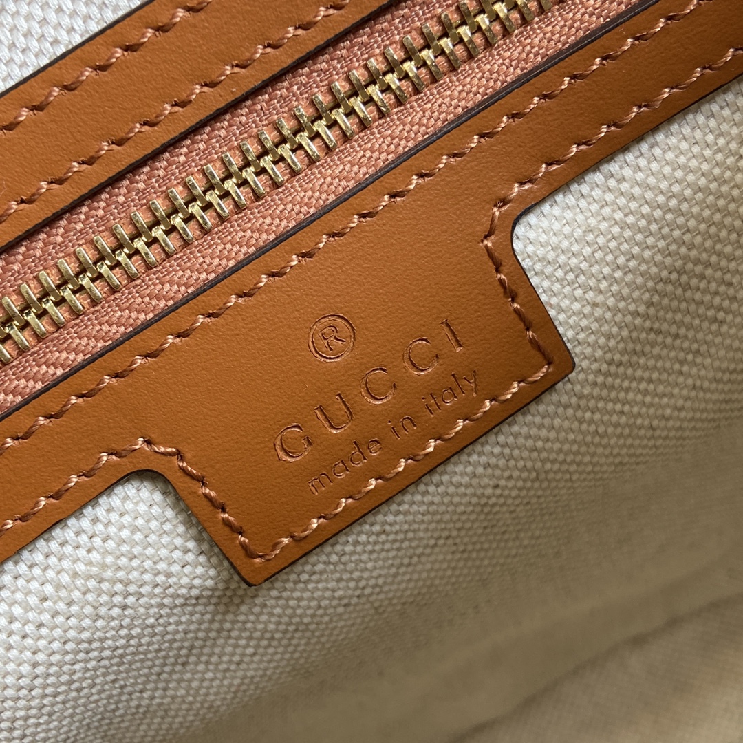 This mini bucket shoulder bag is crafted from classic - Image 9